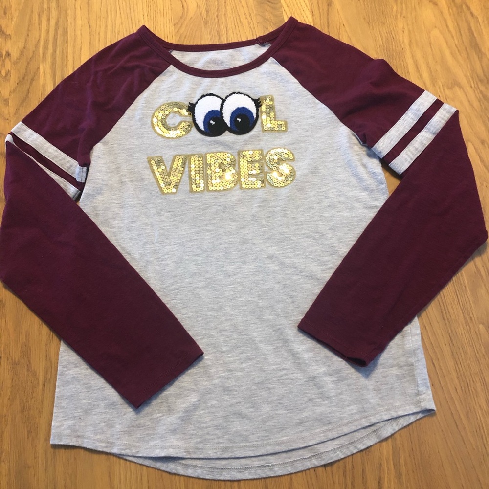 Justice girls long sleeved top EUC